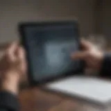 Securing Your Tablet with Insurance A tablet being secured with protective insurance documents