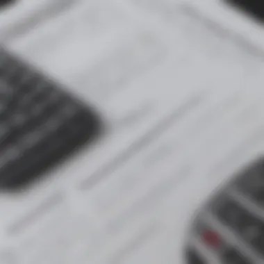 A close-up of a finance agreement document with a calculator, representing financial assessment.
