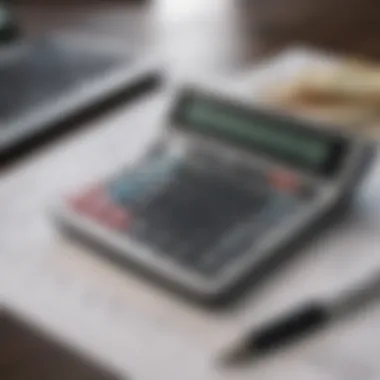 Calculator and Mortgage Documents A close-up of a calculator and mortgage documents.