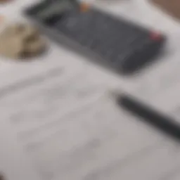 Close-up of a mortgage document with a calculator and pen