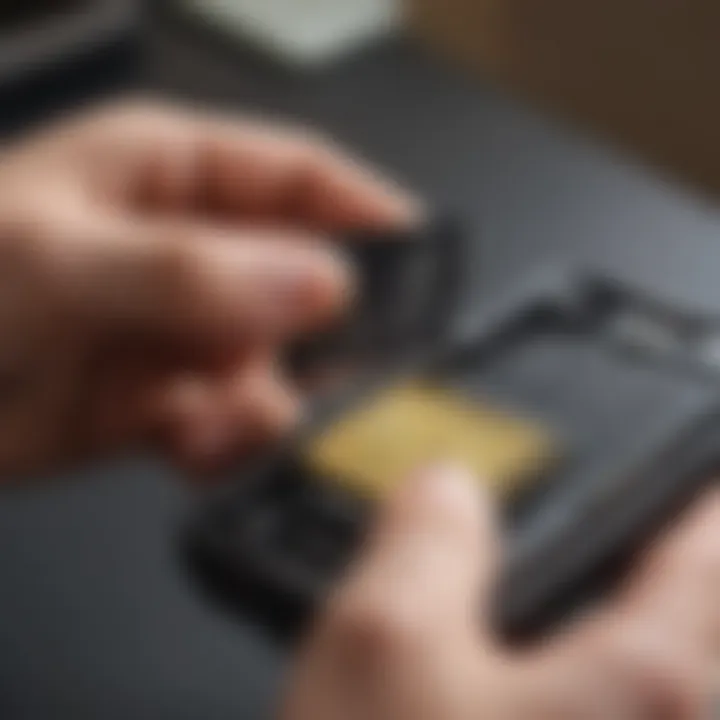 A close-up of a SIM card being inserted into a smartphone.