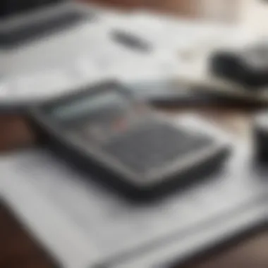 Calculator and Financial Documents on a Table Calculator and financial documents on a table