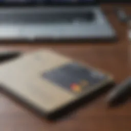 A close-up shot of a credit card on a desk with a notebook and pen, symbolizing financial planning.