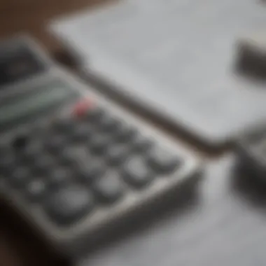 Calculator and financial documents representing mortgage calculations