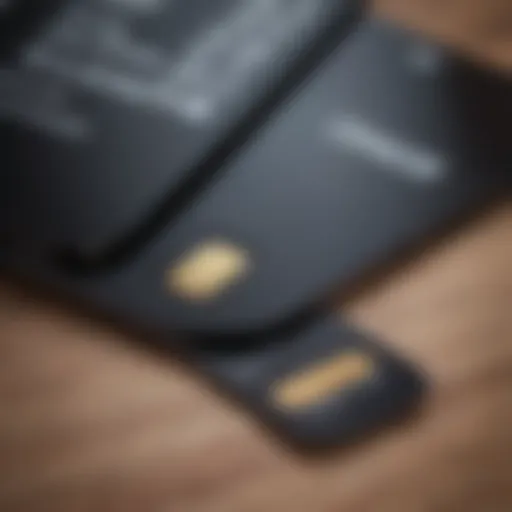 A close-up view of a black SIM card next to an iPhone