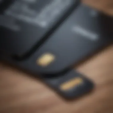 Close-Up of Black SIM Card and iPhone A close-up view of a black SIM card next to an iPhone